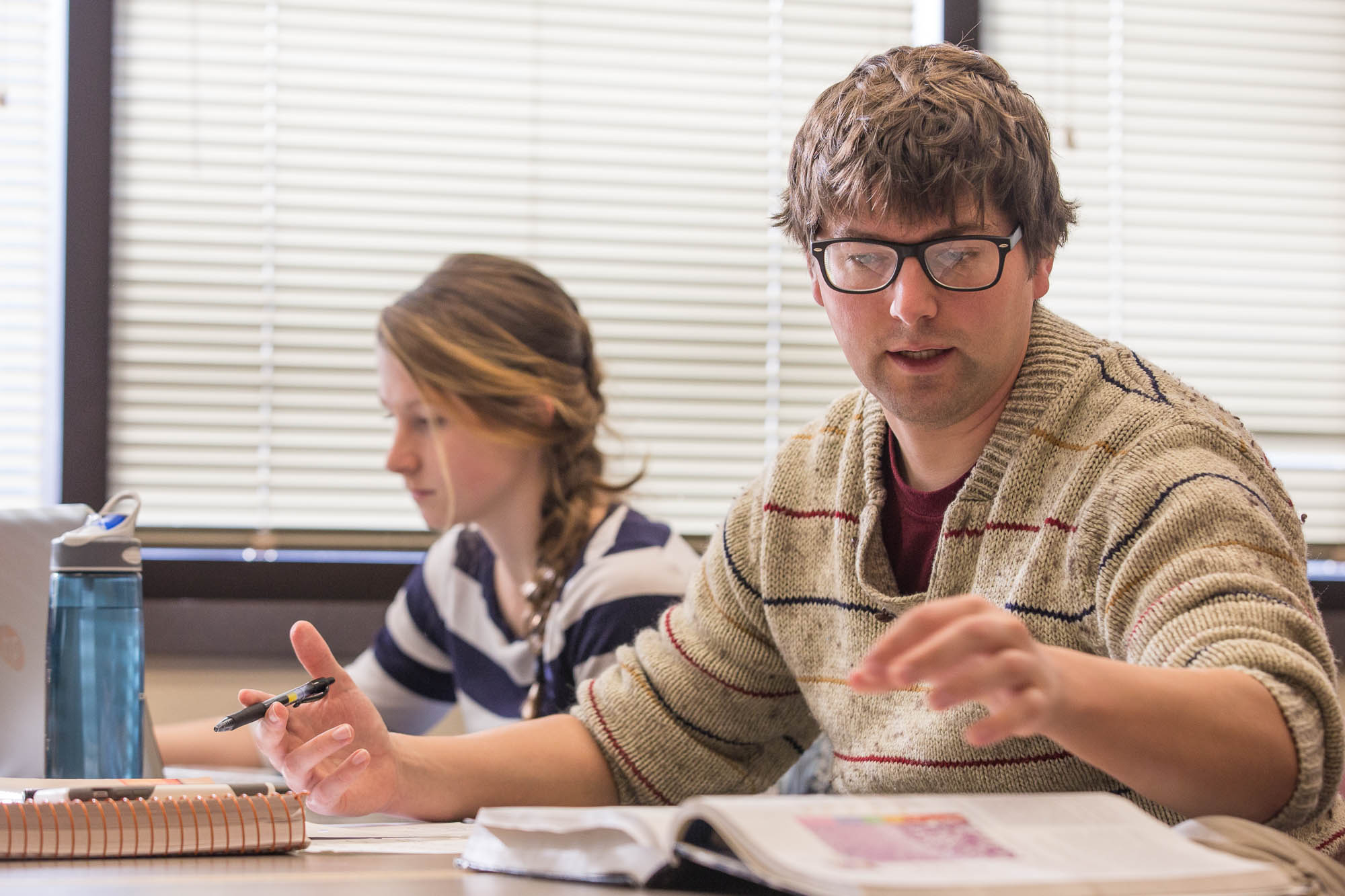 Two students working in class